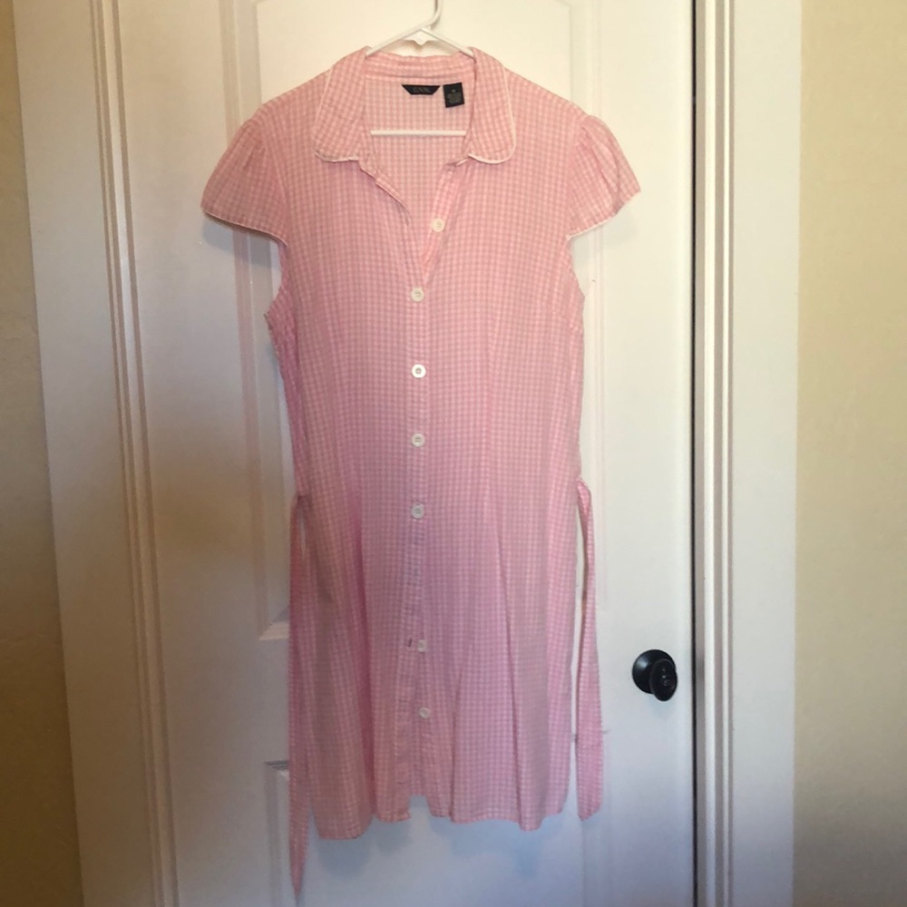 Pink and white gingham style shirt dress.